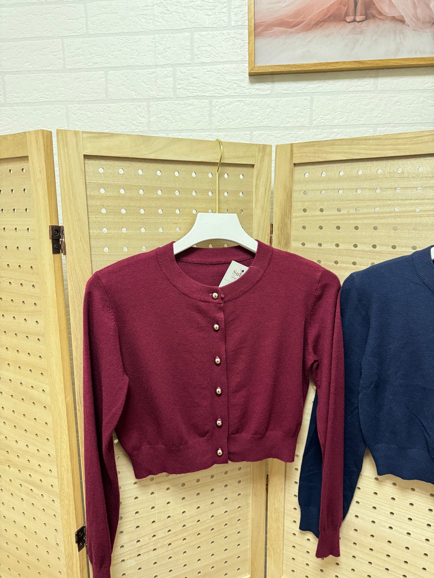 Chaqueta crop de punto con botones